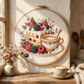 Cake and coffee embroidery hoop styled in a cozy kitchen