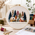 Scandinavian winter village embroidery kit finished design
