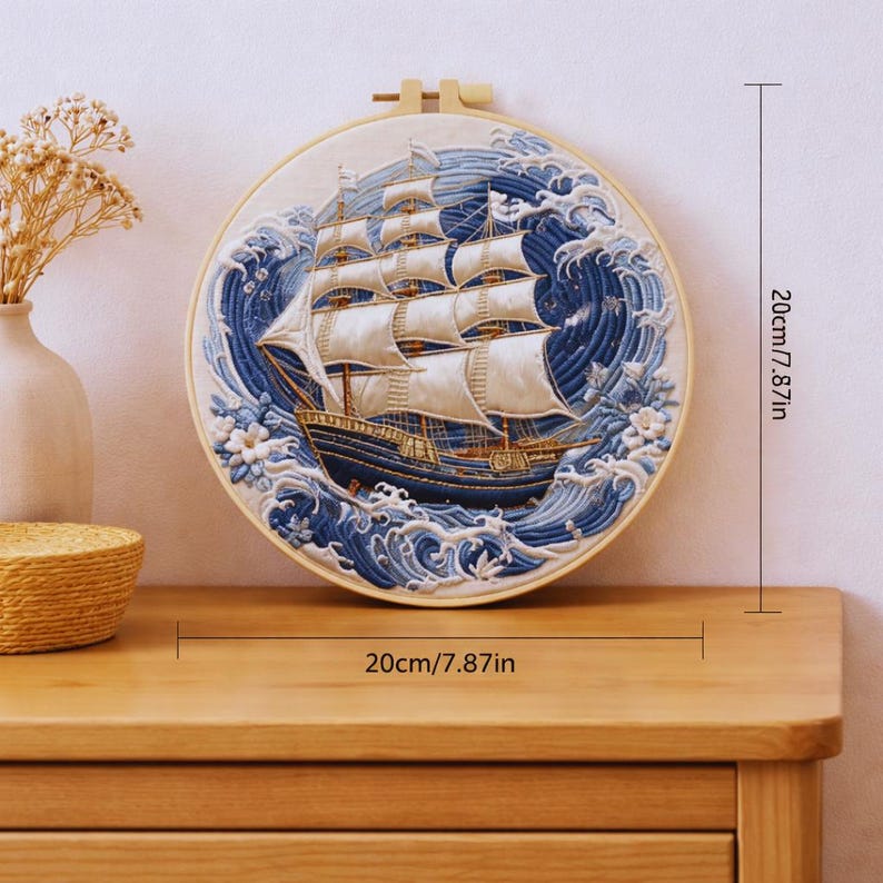 Sailing ship embroidery displayed on wall
