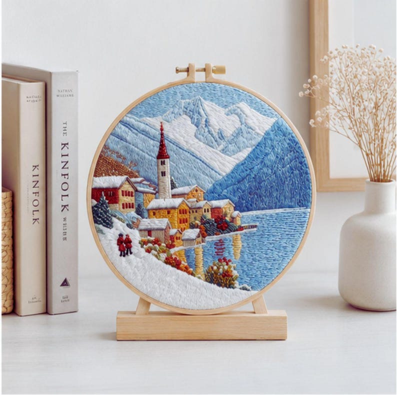 Snowy mountain village embroidery hoop art