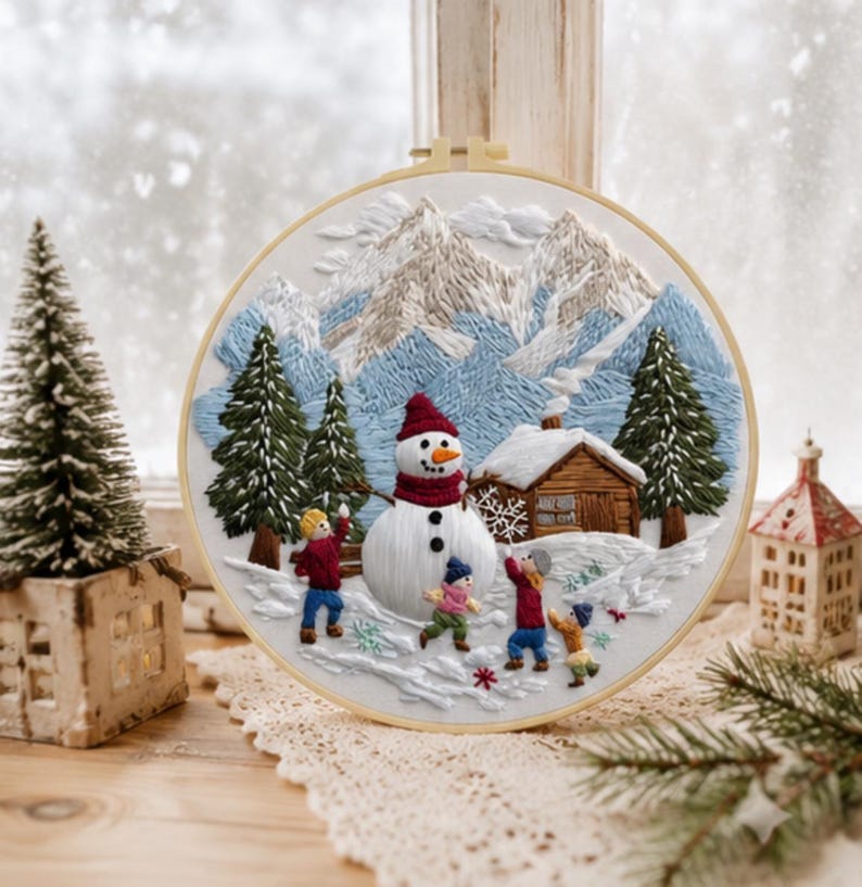 Winter snowman embroidery kit displayed as winter decor
