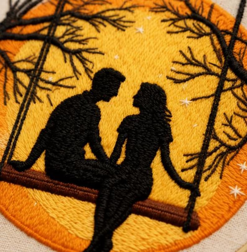 Couple moon embroidery displayed as wall decor